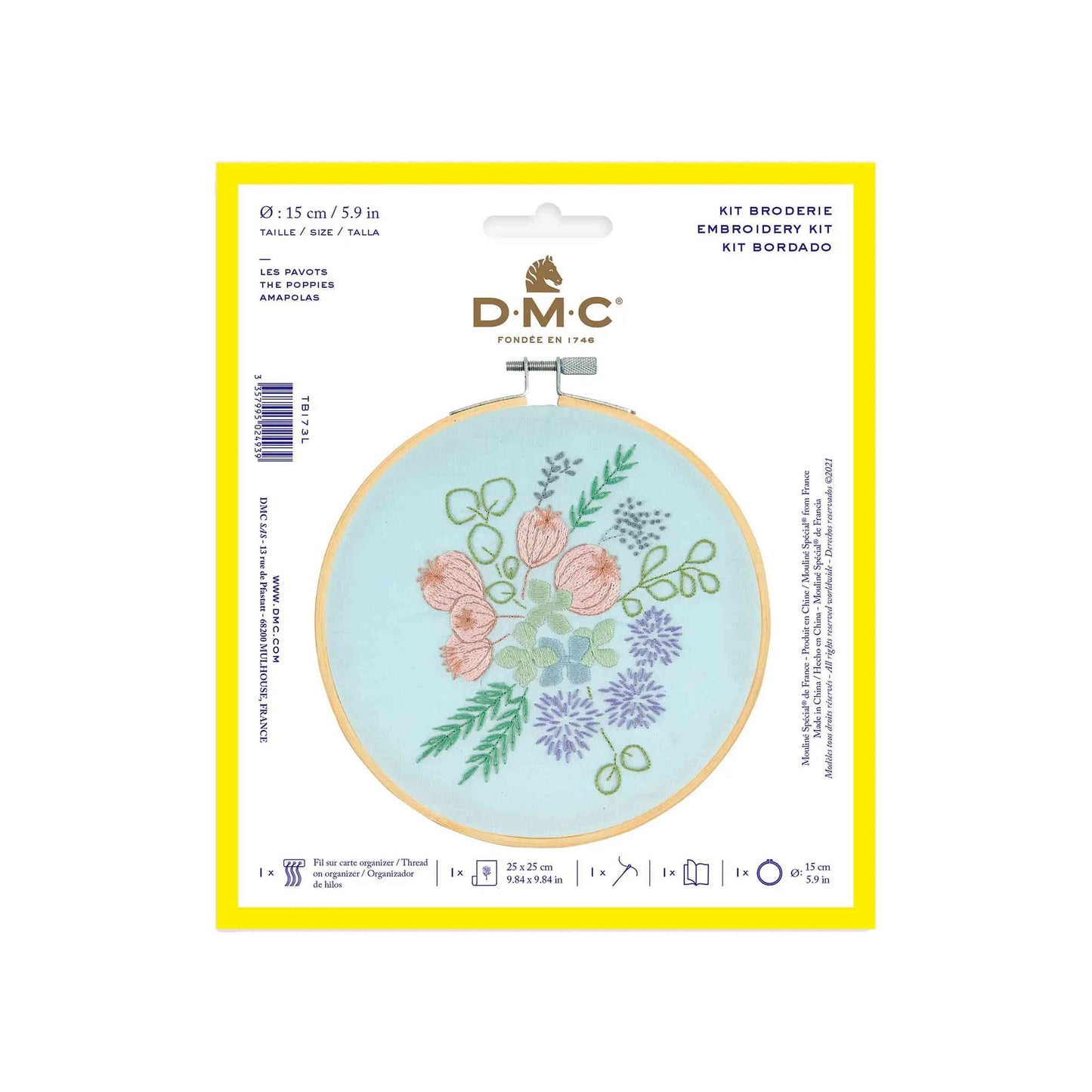 DMC Poppies Embroidery Kit on a white background. The kit comes with light blue fabric, a wooden embroidery hoop and features embroideries of various flowers and leaves including poppies